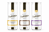 Three PapaNicholas 11 oz cans: Madagascar Vanilla Latte, Mocha Latte, and Salted Caramel Latte